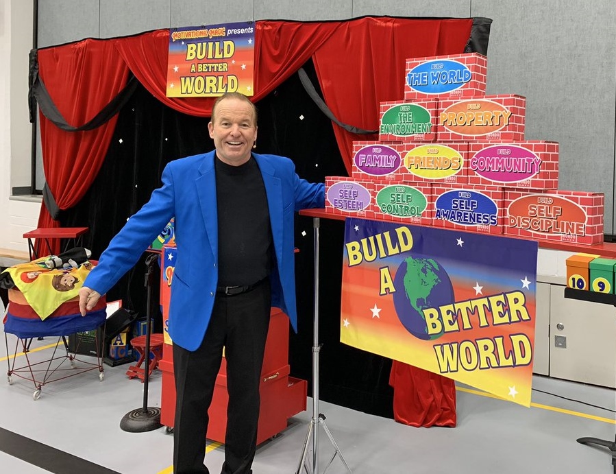 Courage Character and Caring Steve balancing blocks