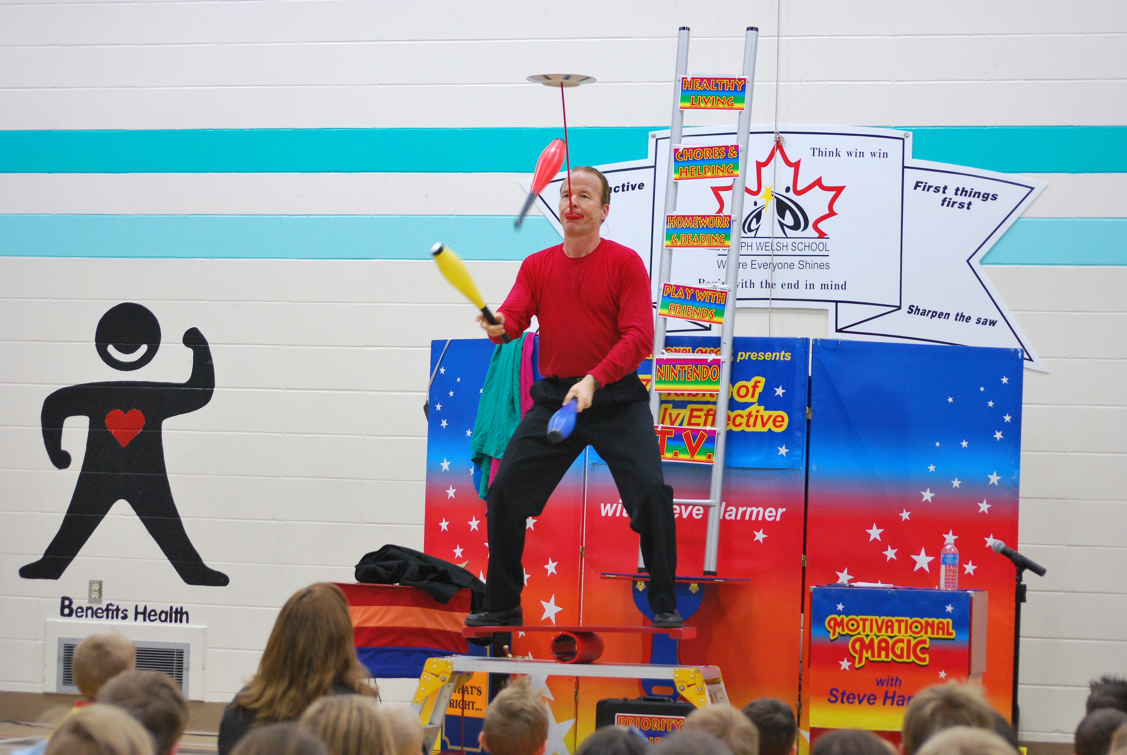 Courage Character and Caring Steve balancing blocks