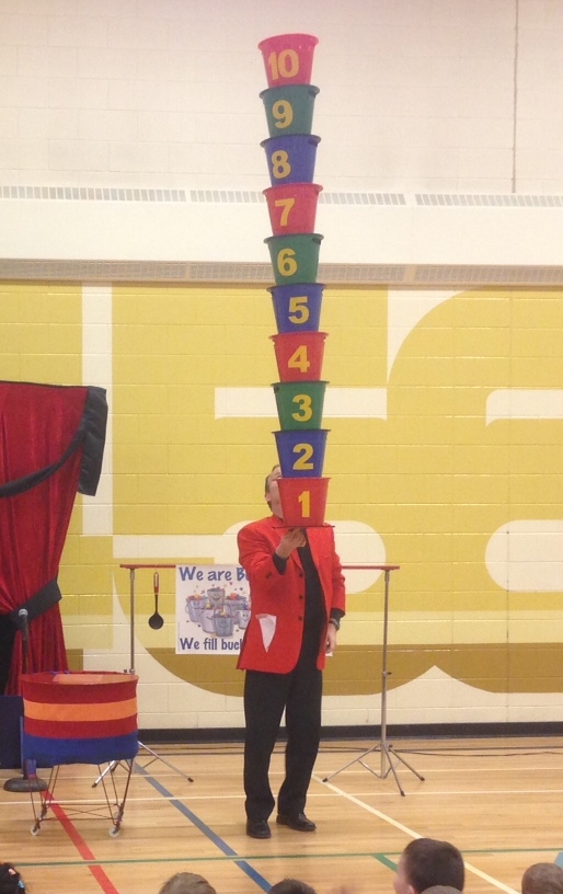 Courage Character and Caring Steve balancing blocks