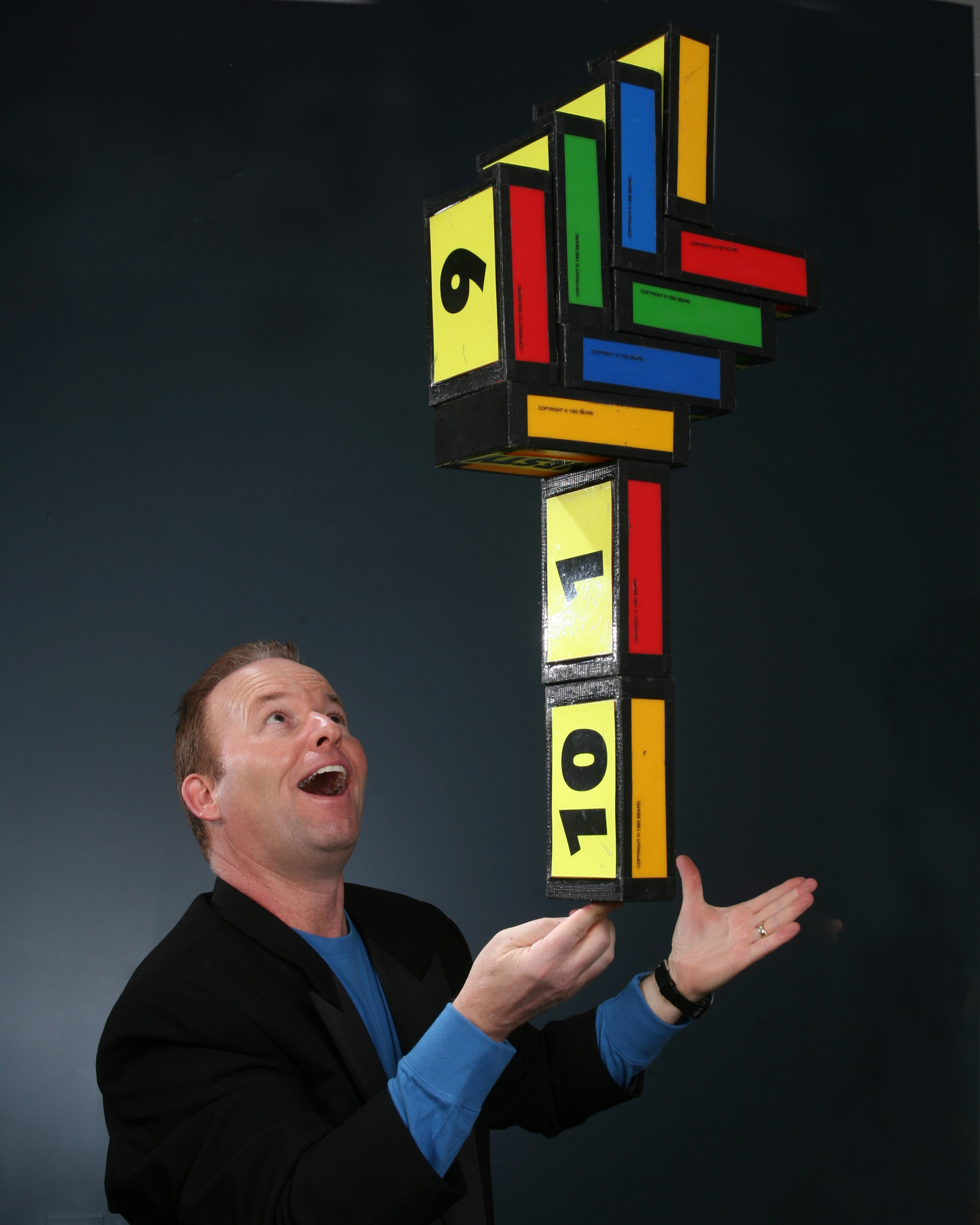 Courage Character and Caring Steve balancing blocks